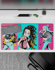 Anime mouse pad 32x16 inches featuring Nezuko with oversized glasses and bubble tea, vibrant Tokyo street-style design.
