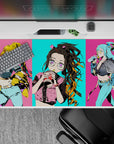 Anime desk pad 40x20 inches featuring Nezuko in oversized glasses with bubble tea, vibrant in cyan and hot pink.