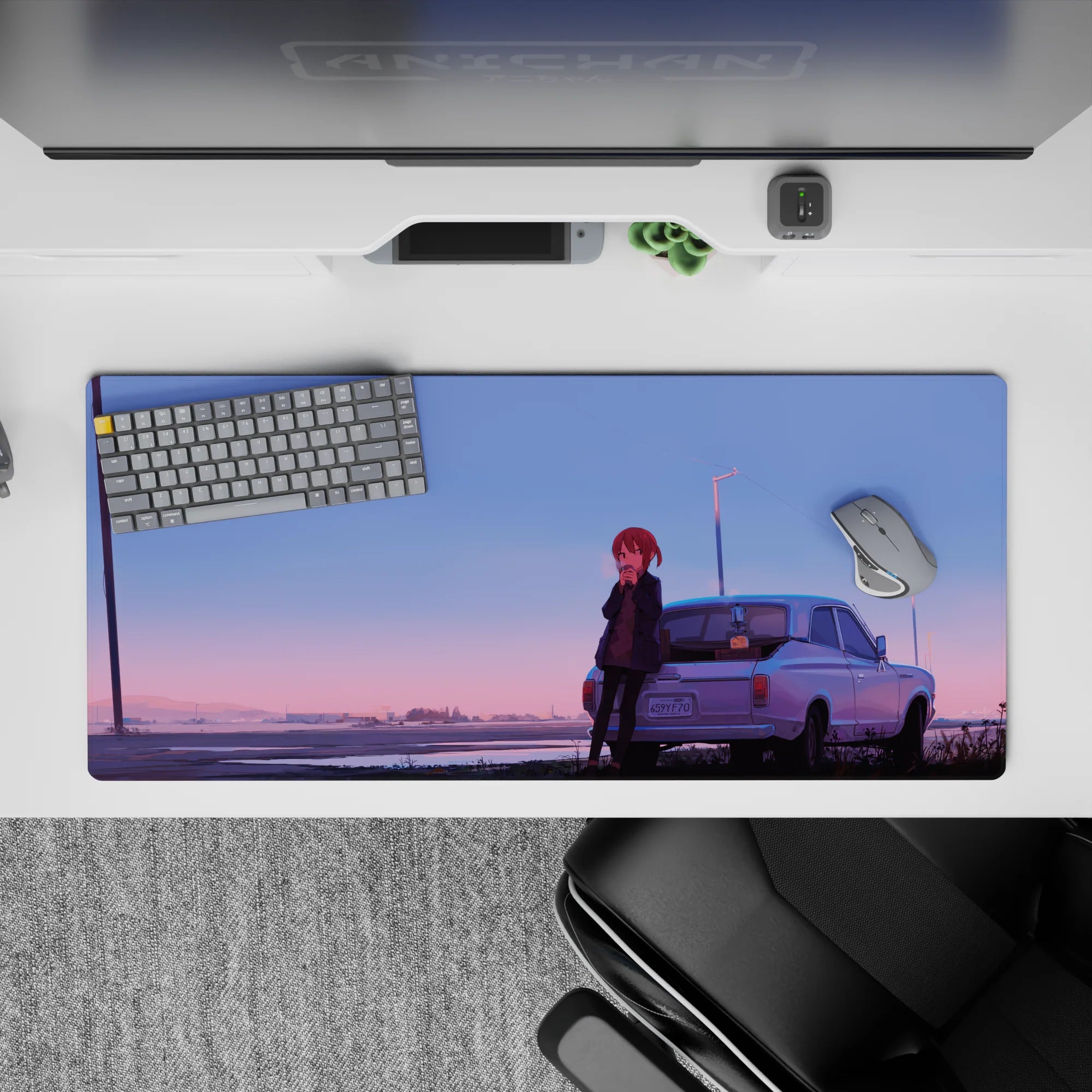 Dreamy gradient anime desk pad 36x16 inches in blue-to-peach sunset tones with wet street glow.