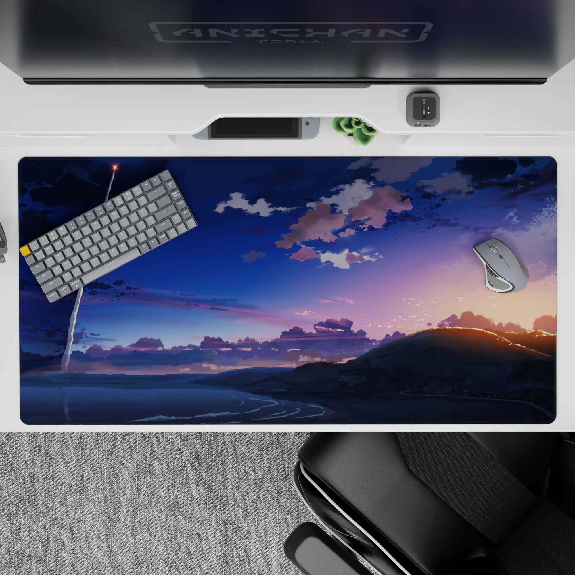 Indigo and peach sunset anime desk pad 40x20 inches, calm bittersweet vibe for gaming or work.