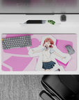 32x16 inches kawaii desk mat in soft pink and cream, cheerful vibes with blue plaid accents.