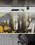 Anime desk pad 40x20 inches in warm golds and cool whites, misty greens, calm-before-chaos mood.