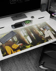 Naruto and Sasuke facing off in a quiet forest scene on an anime desk pad 40x20 inches.