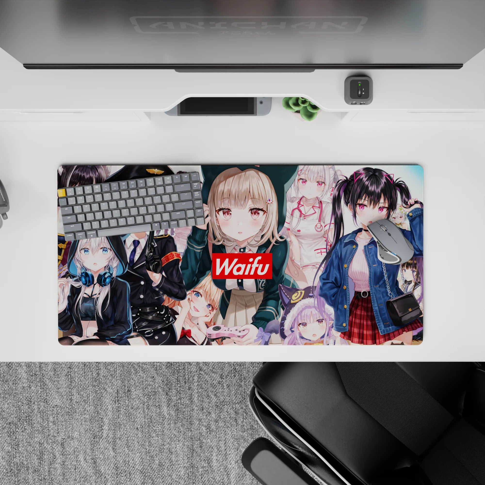 Bright cozy-chaos anime girl mouse pad in pink, black, white, and denim blue, 32x16 inches.