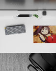 Megumin from KonoSuba anime mouse pad, 14x10 inches, lying flat with thumbs up, crimson cloak and witch hat, humorous vibe.