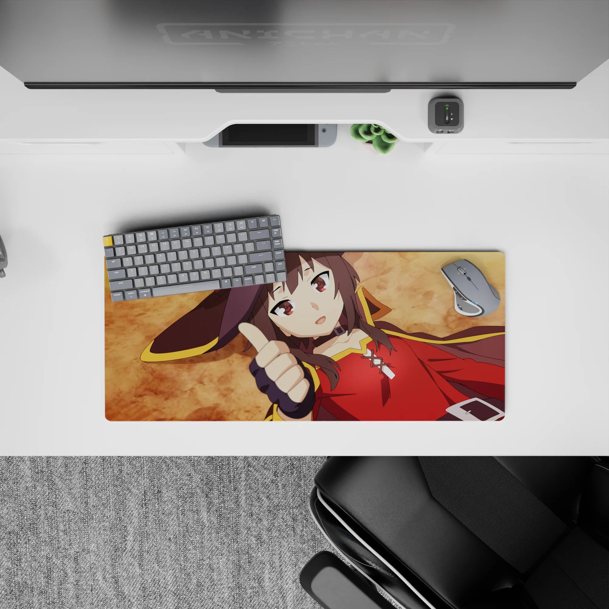 Megumin from KonoSuba lying flat with thumbs up on a 28x12 inch anime mouse pad, vibrant ochre background, crimson cloak.