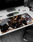 40x20 inches anime desk pad showing curly-haired commander lunging forward, cloak whipping through sparks.