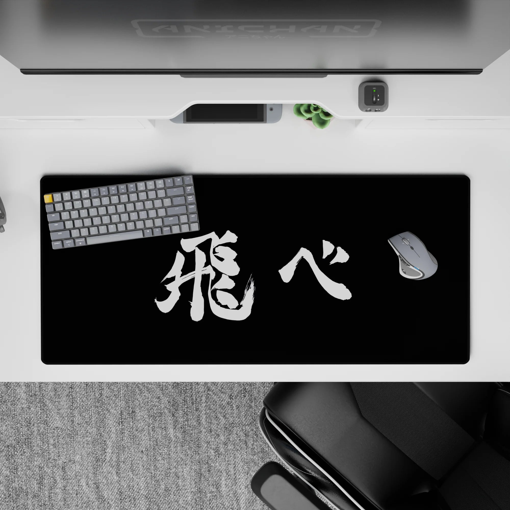 36x16 inches anime desk pad in stark black and crisp white ink, calm focused mood for smooth tracking.