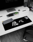 32x12 inches anime mouse pad showing hand-painted white kanji strokes on black, like a frozen manga panel.