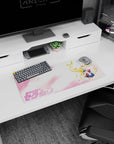 28x12 inches Sailor Moon mouse pad with golden twin tails raised high as petals float through pink skies.