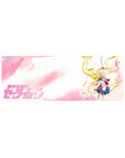 32x12 inches anime girl mouse pad with Sailor Moon in victory pose, petals drifting, airy pink sky background.