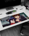 Eyepatch girl with twin tails and boy with green eyes in a split-second schoolyard scene desk pad 36x16 inches.