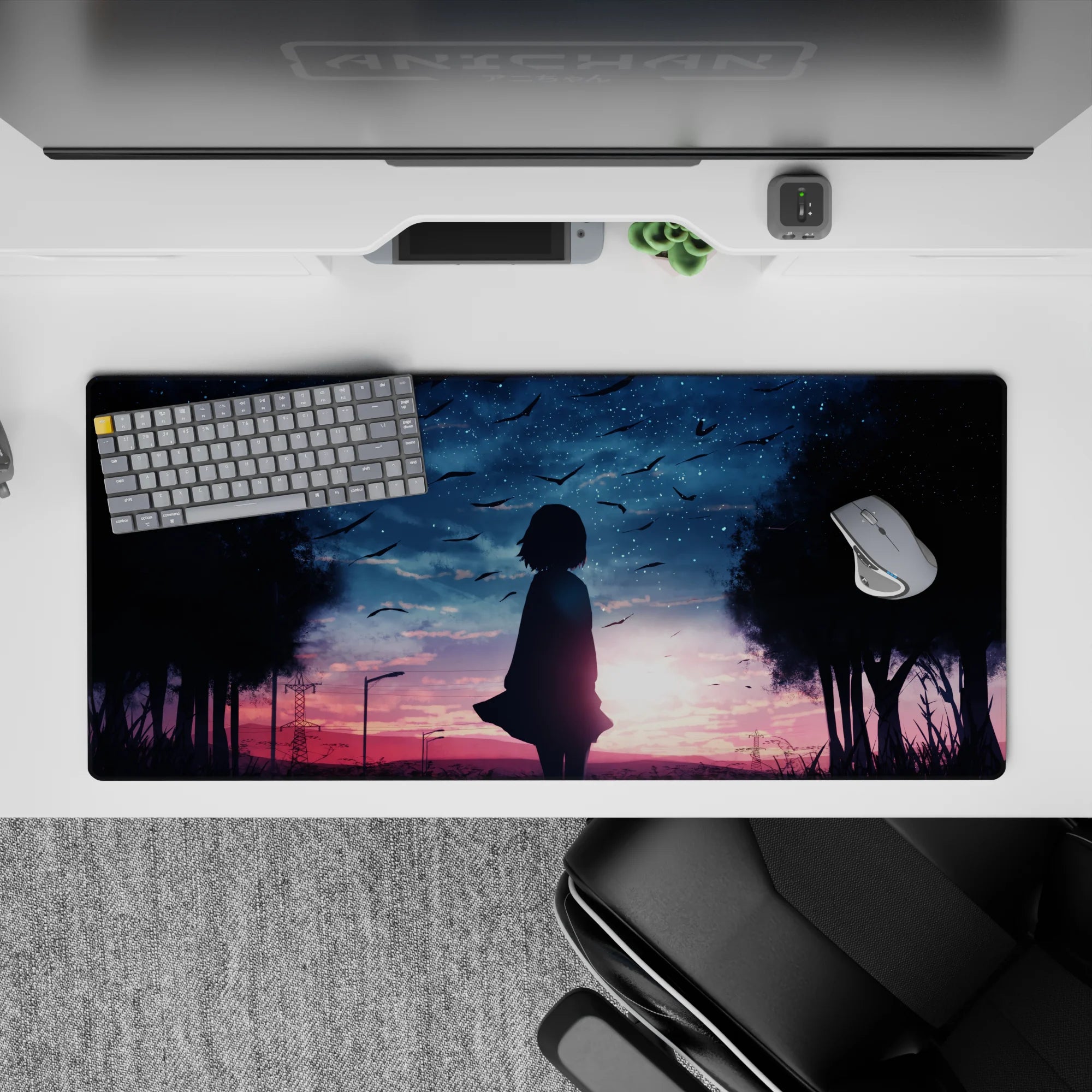 Anime girl desk pad 36x16 inches in pink-violet dusk fading to deep navy, soft dreamy bittersweet mood.