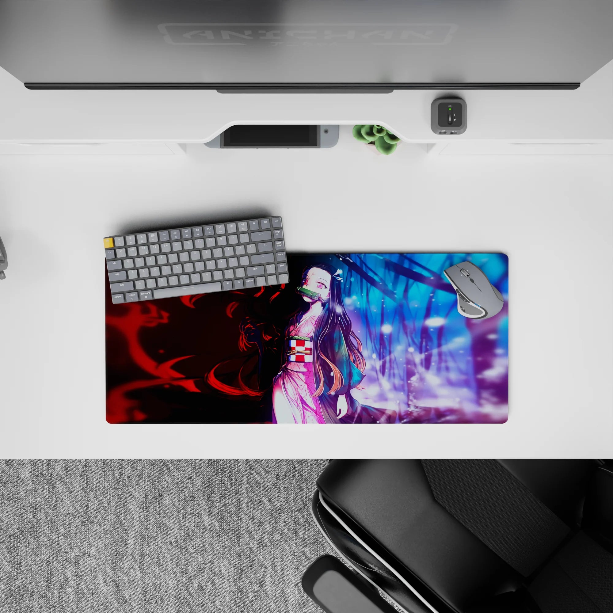 Anime mouse pad 28x12 inches featuring Nezuko from Demon Slayer, showcasing dual worlds in red and blue hues with a pink kimono.