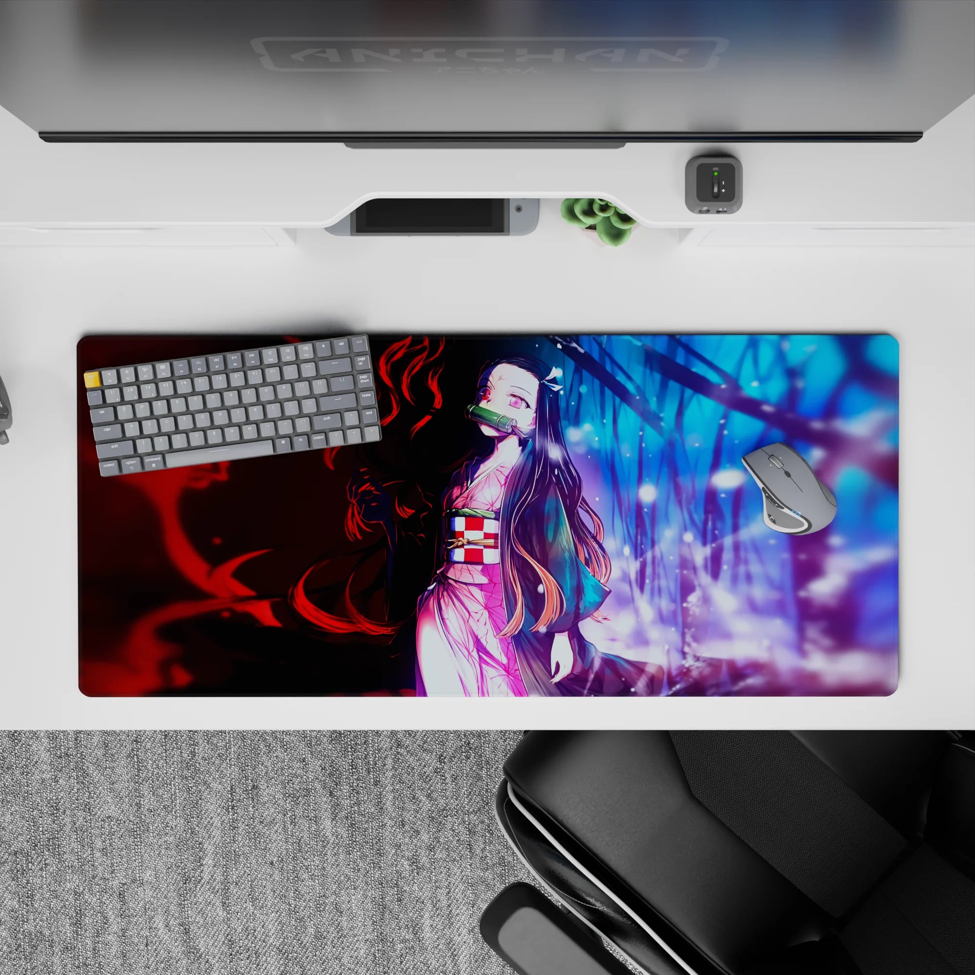 Nezuko anime desk pad 36x16 inches with red and blue worlds, pink kimono, capturing duality and emotion.