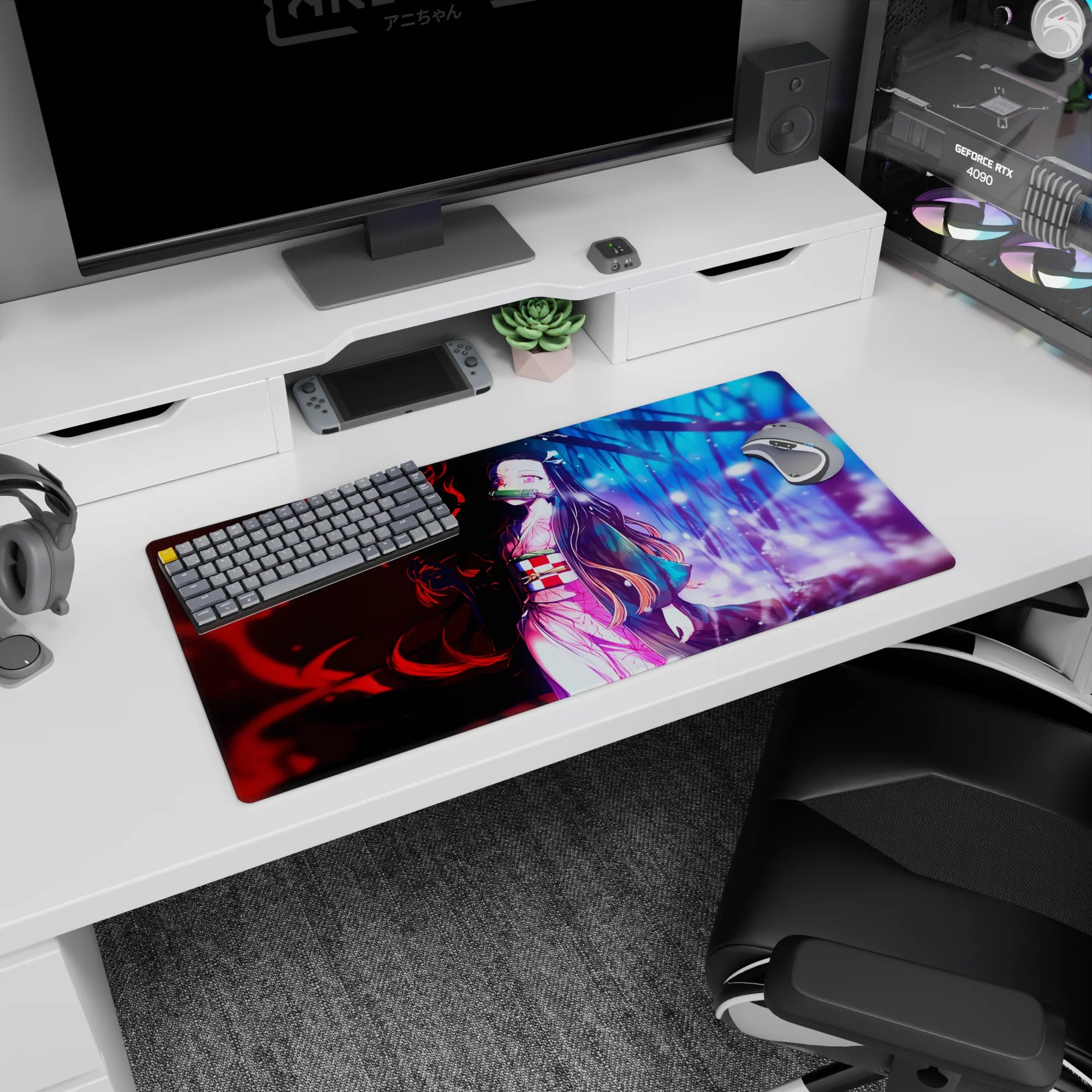 Nezuko anime mouse pad 32x16 inches, features dual worlds, her pink kimono glows amid red and blue hues, blending tension and calm.