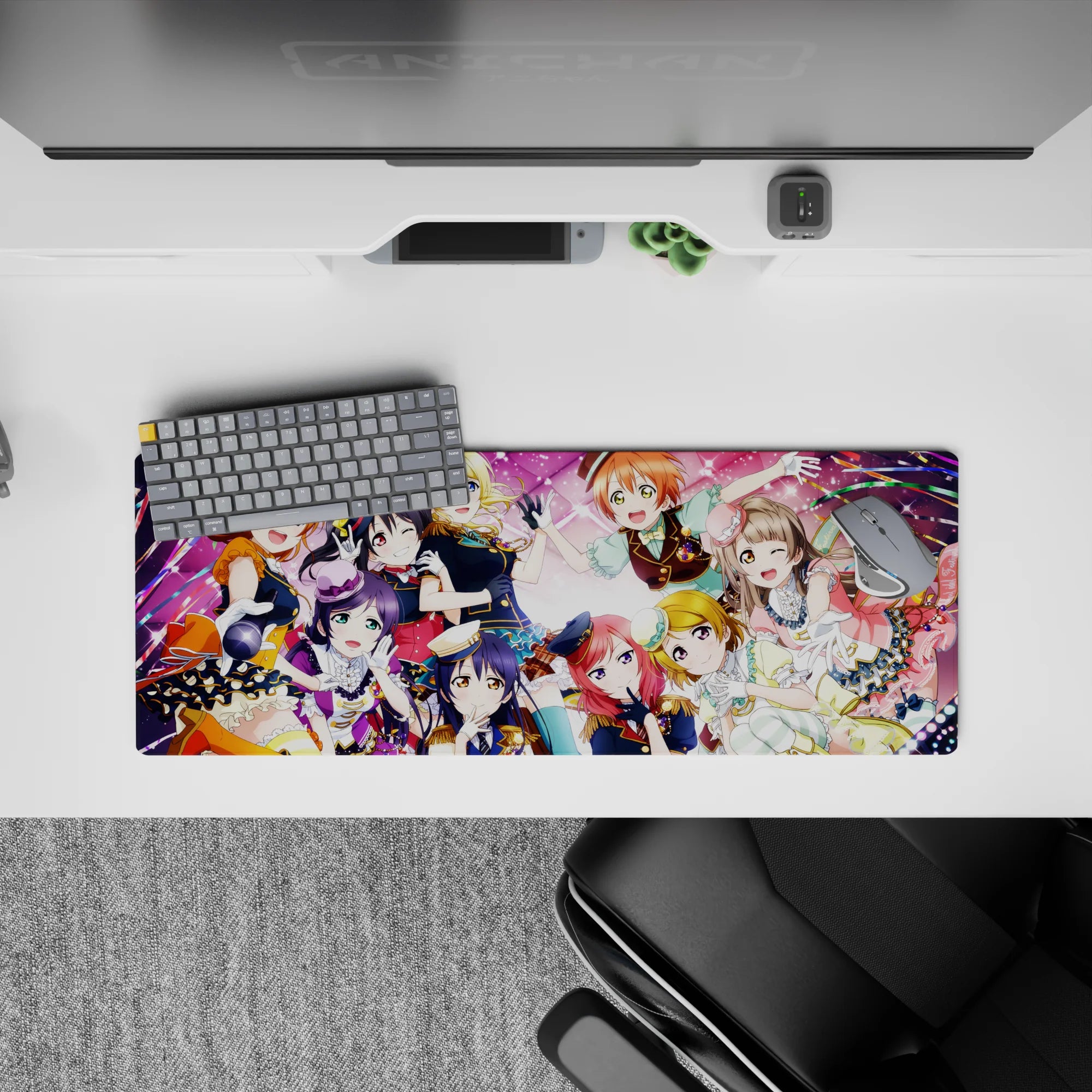 Candy pink concert vibes anime girl mouse pad, 32x12 inches, with confetti ribbons and stage lights.