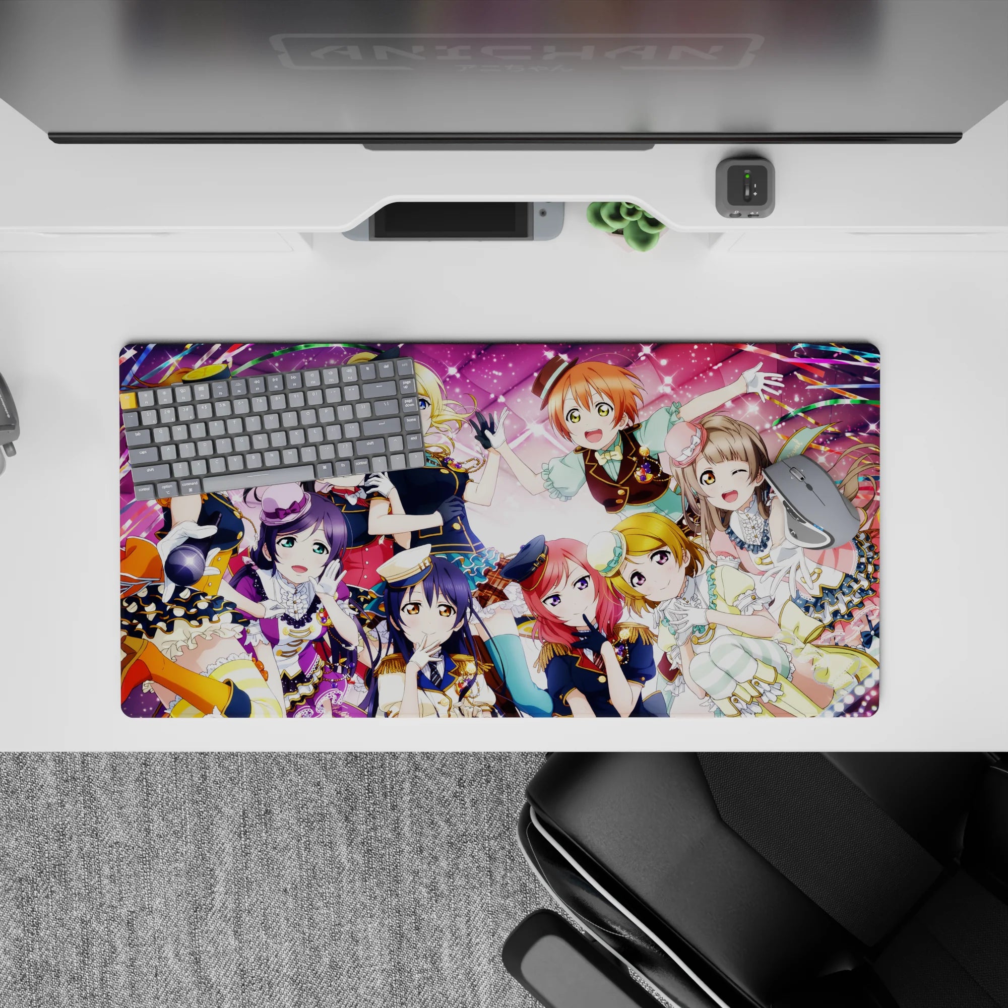 Candy pink anime girl mouse pad 32x16 inches with confetti ribbons, stage lights, and happy vibes.