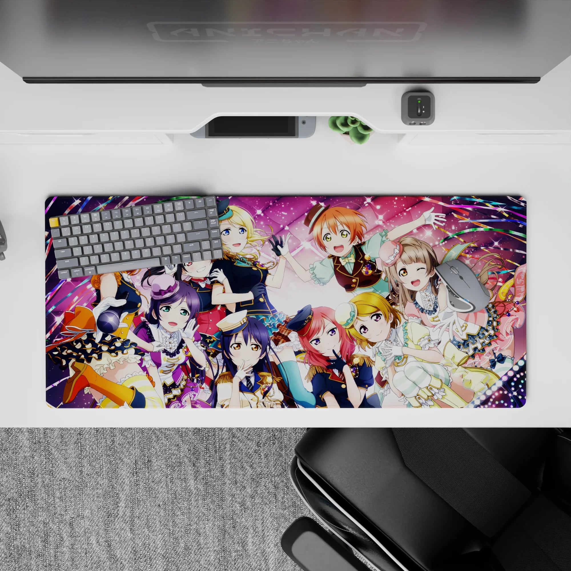 Candy pink concert vibes anime girl desk pad with confetti ribbons and stage lights, 36x16 inches.