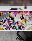 Candy pink anime girl mouse pad with confetti ribbons and stage lights, cheerful vibe, 40x20 inches.