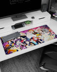 Honoka, Umi, and Kotori in a sparkly idol group hug scene anime girl desk pad, 36x16 inches.