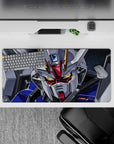 32x16 inches anime mouse pad in deep space tones with glowing gold eyes, crisp blue panels, bold reds.