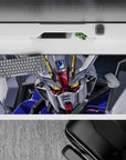 Gold-glowing eyes on deep space anime desk pad 36x16 inches, crisp white armor with red and blue.