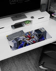 28x12 inches Gundam SEED Strike Gundam mouse pad, intense cockpit-ready stare with glowing gold eyes.