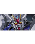 Strike Gundam SEED face-shot anime desk pad 36x16 inches with white armor, red accents, blue panels.