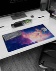 32x16 inches anime mouse pad with Howl and Sophie drifting through the sky beside a huge winged creature.