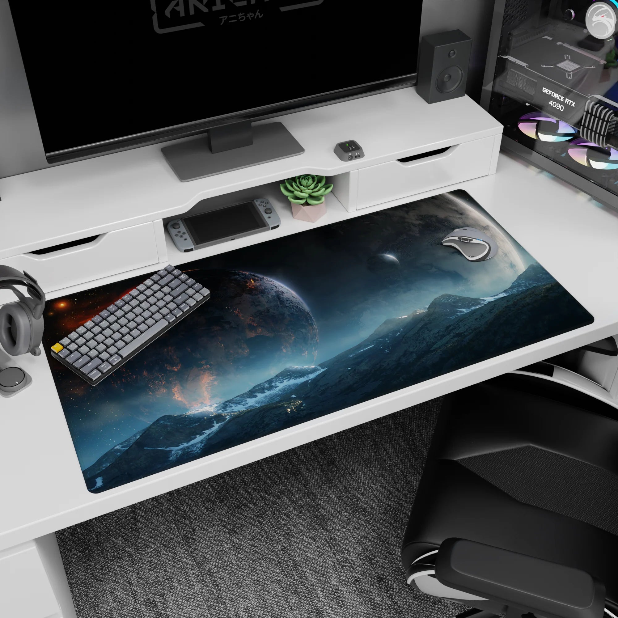 Giant glowing planet over misty mountains with a tiny moon and starlight desk pad, 40x20 inches.