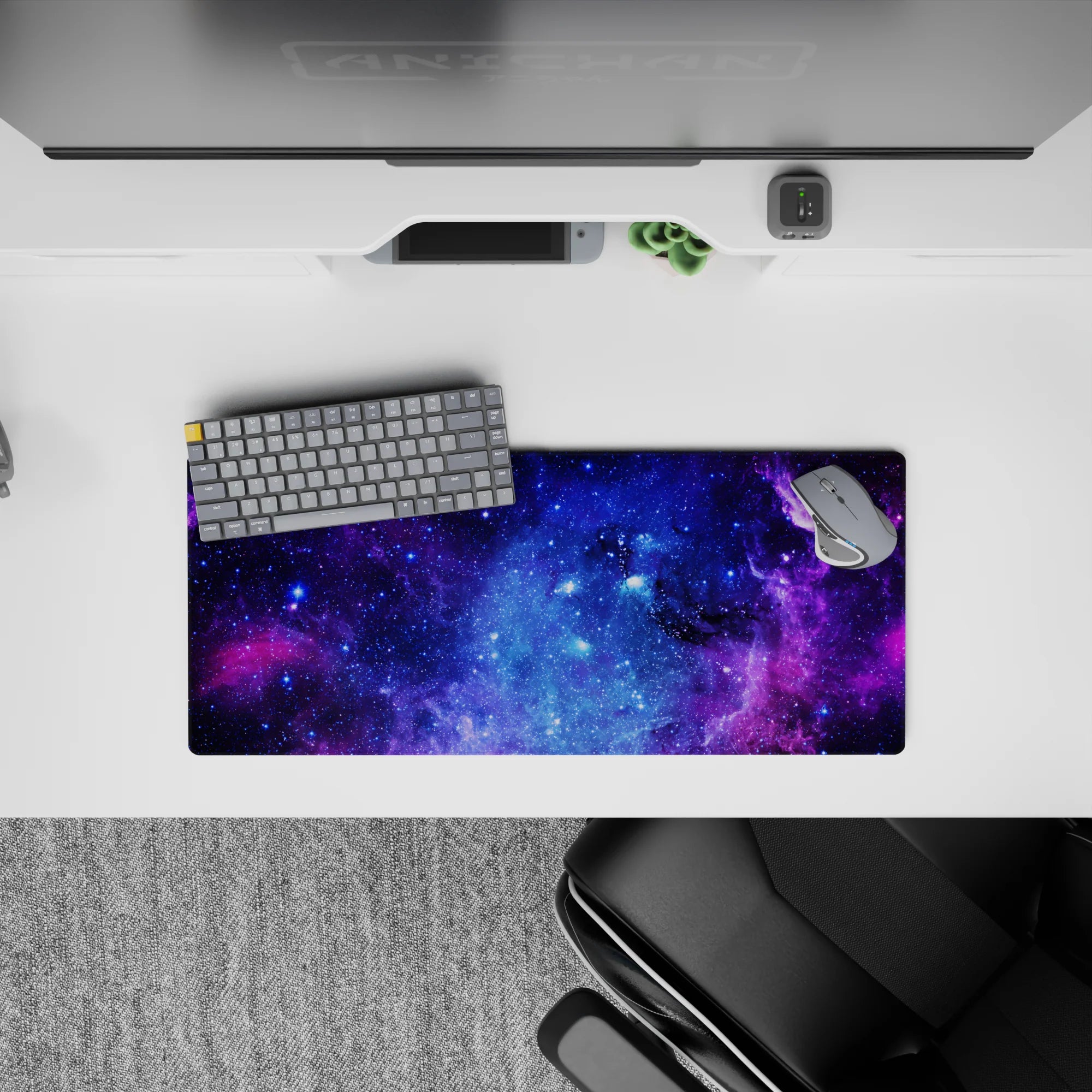 Velvety purple and electric blue 28x12 inches mouse pad with calming night-sky mood and stars.