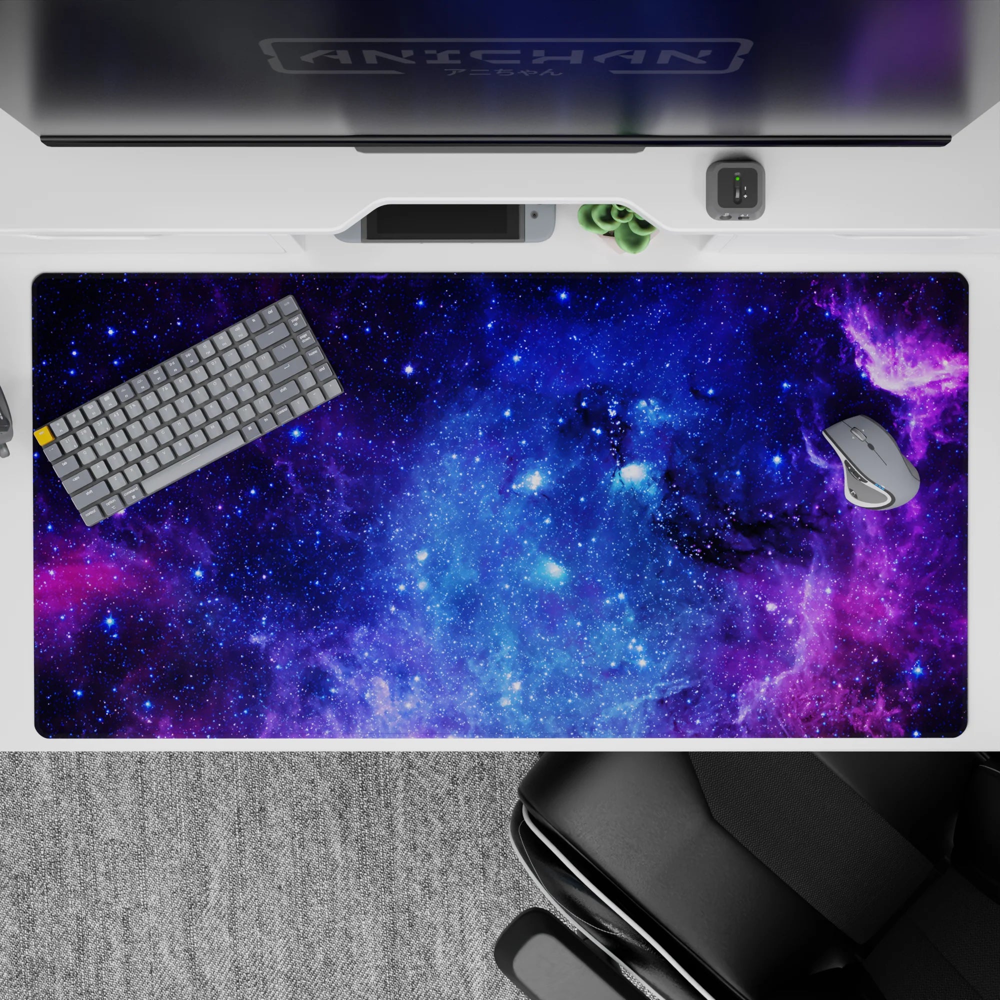 Velvety purples and electric blues galaxy desk pad 40x20 inches, calming night-sky mood.