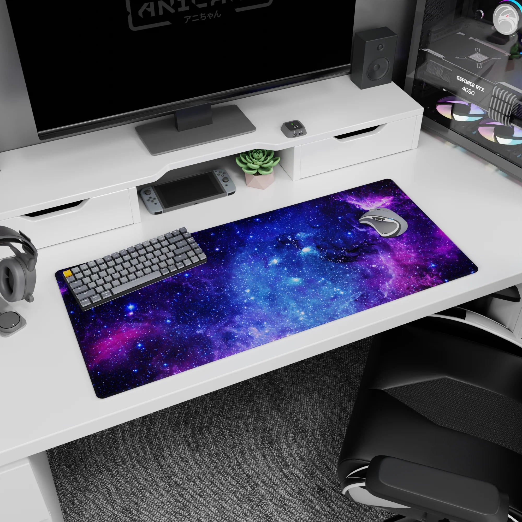 Swirling nebula clouds and inky deep-space pockets desk pad, 36x16 inches, star-dusted scene.
