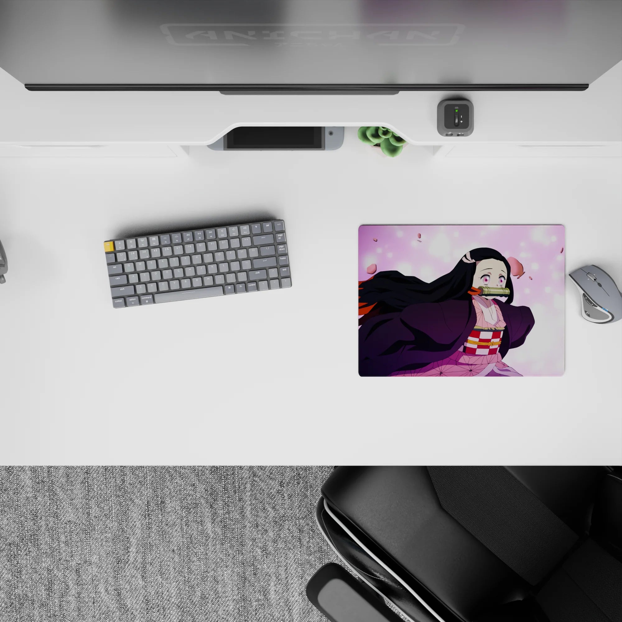 Nezuko from Demon Slayer on 14x10 inch mouse pad, surrounded by sakura petals, captures her fierce yet gentle nature.