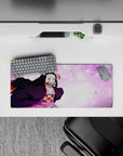 Nezuko from Demon Slayer on a 28x12 inch mouse pad, surrounded by sakura petals and pastel hues, full of charm and energy.