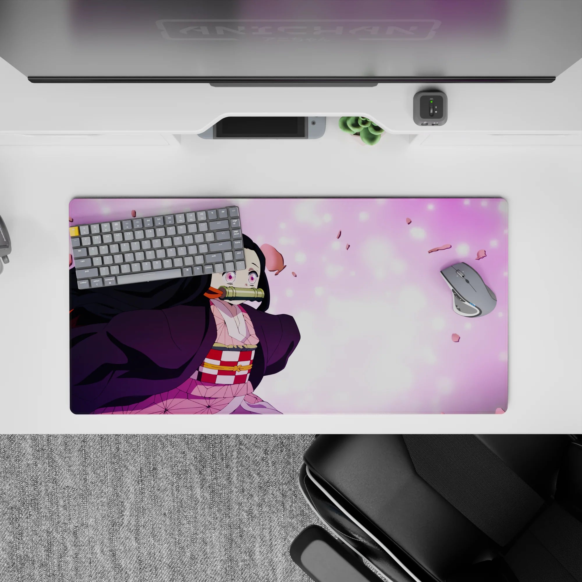 Nezuko anime mouse pad 32x16 inches, featuring Nezuko in a pink haze with sakura petals, exuding charm and determination.