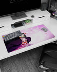 Nezuko anime mouse pad 32x16 inches, featuring vibrant sakura petals and Nezuko's determined, charming expression.