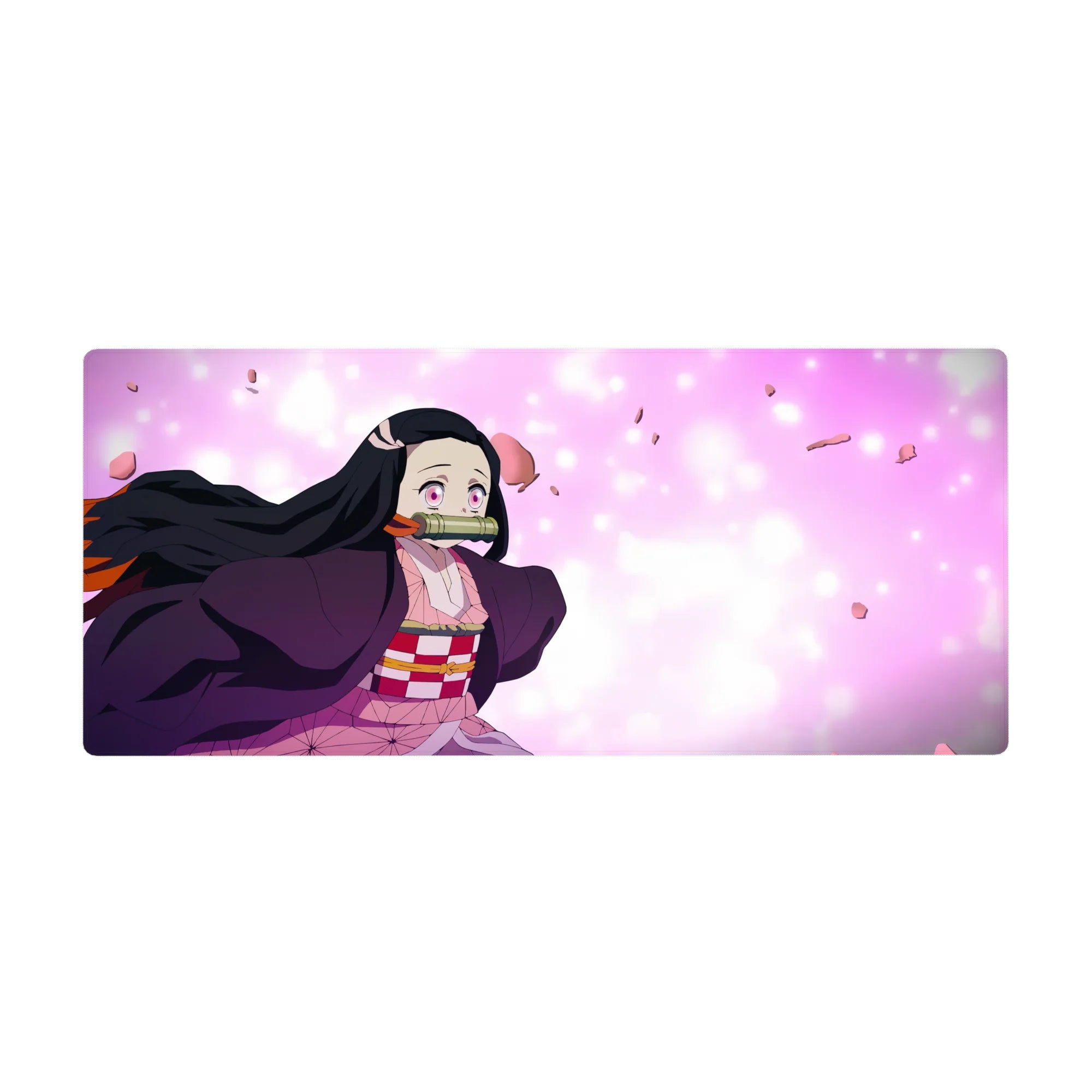 Anime desk pad 36x16 inches featuring Nezuko from Demon Slayer in a pink haze with sakura petals and vivid, determined eyes.