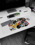 36x16 inches anime desk pad featuring teal-haired fighter with goggles, gloves, and chunky weapon mid-charge.