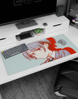 Calm, slightly stubborn anime girl with bow and gray-blue hair on desk pad 36x16 inches.