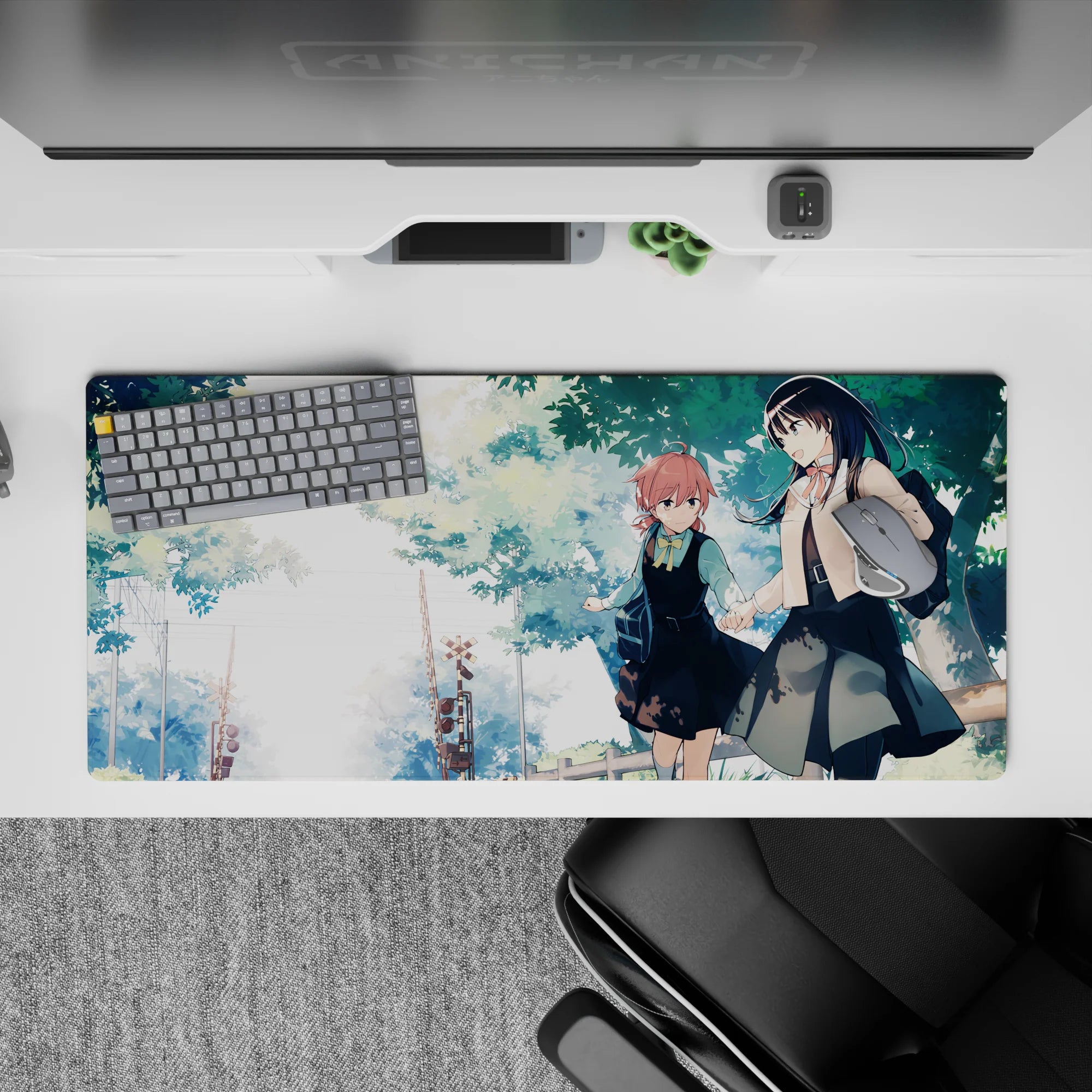 36x16 inches anime girl desk pad in soft pastels and warm watercolor shadows, calm slice-of-life vibe.