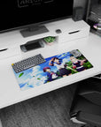 Three cute anime heroines on a beachy school adventure scene mouse pad 28x12 inches with swaying palms.