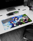 32x16 inches anime girl mouse pad showing three cute heroines posing under palm trees and clouded sky.