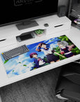 36x16 inches anime desk pad showing three cute heroines beneath tropical clouds and swaying palms.