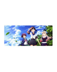 Anime girl mouse pad 28x12 inches with three schoolgirls, palm trees, and drifting leaves under cobalt clouds.