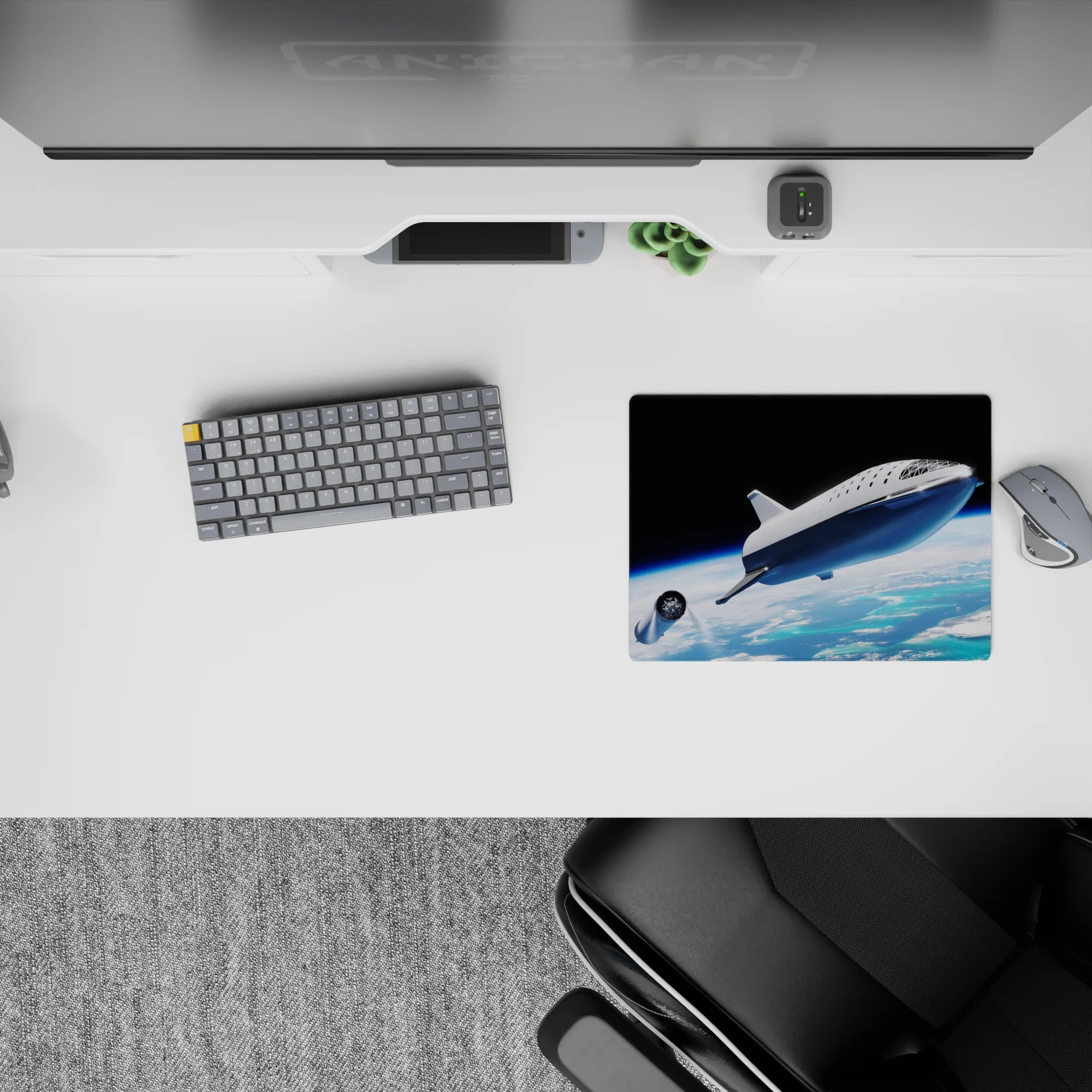 Cosmic 14x10 inches mouse pad in deep black with calming glow, airy gradients, and bright ocean blues.