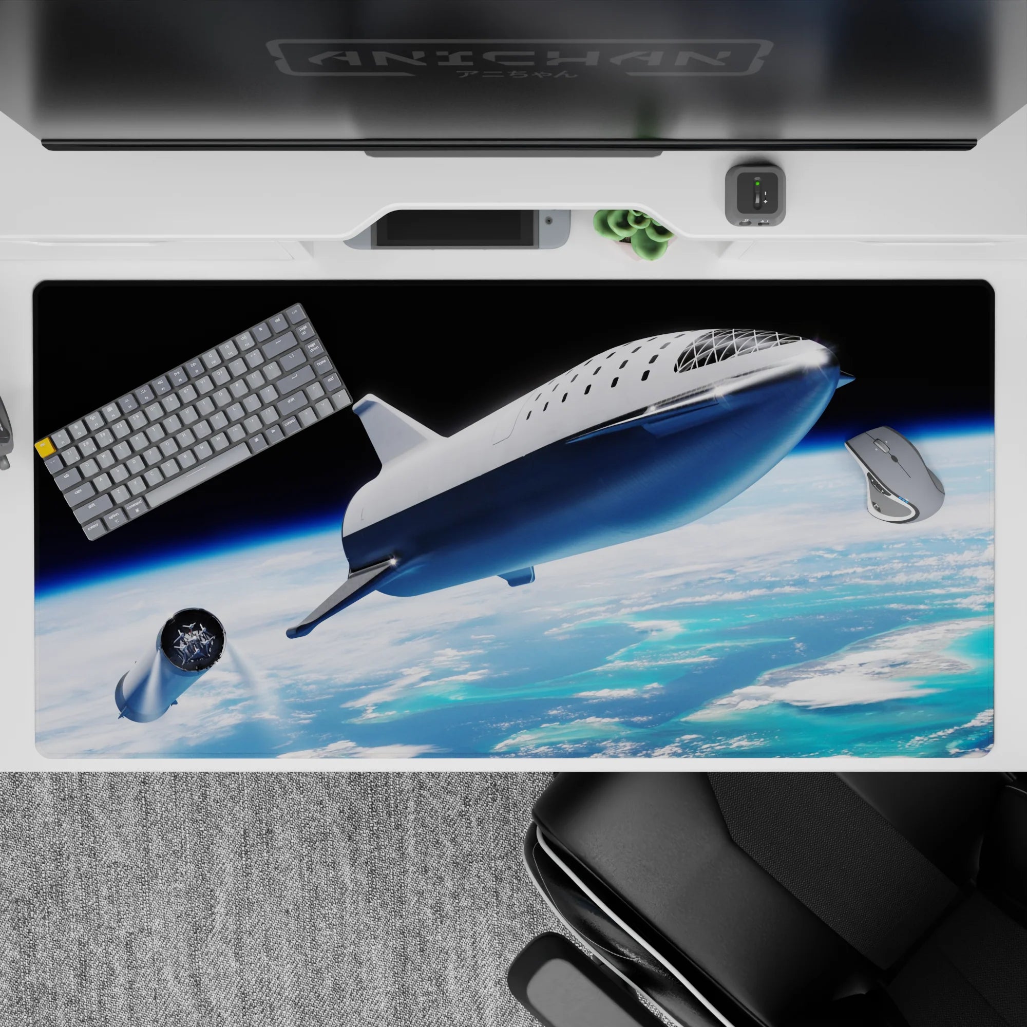 Moody black sky desk pad 40x20 inches with bright blues, soft clouds, and calm glowing horizon.