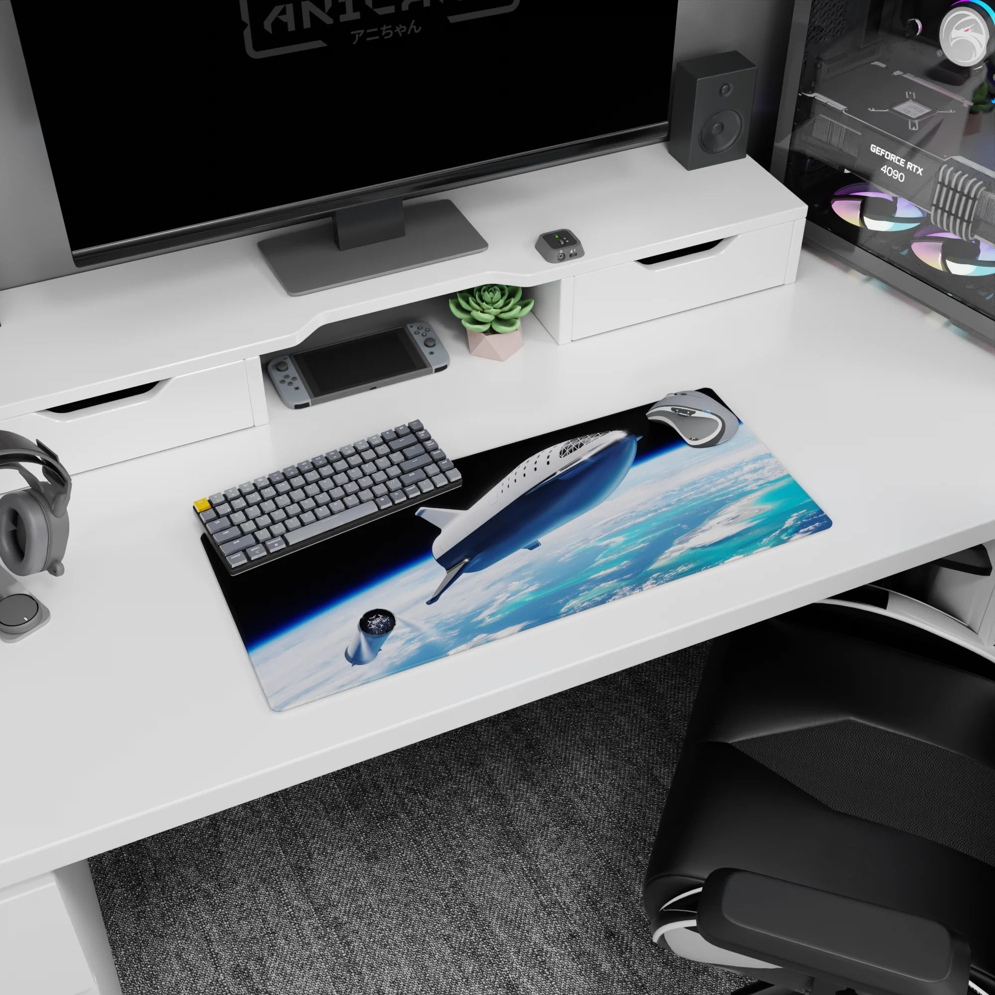 Silver spaceship cruising over cloud swirls and ocean blues on a 28x12 inches extended mouse pad.