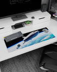 Silver starship cruising above swirling clouds and blue sea on a 32x12 inches extended mouse pad.